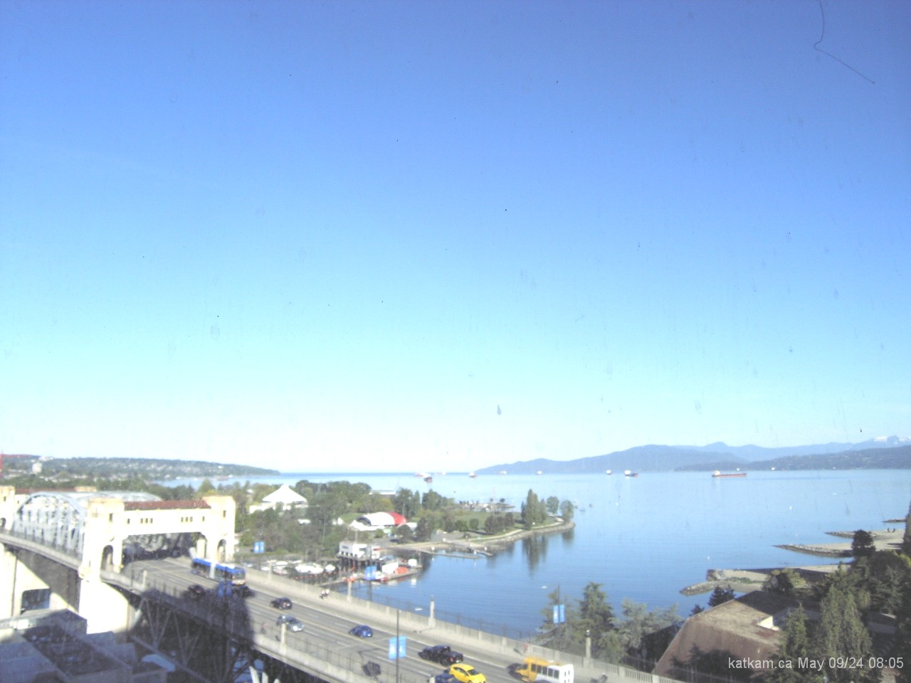 Click for a larger Vancouver BC webcams image facing toward English Bay, the mouth of False Creek and the Burrard Bridge